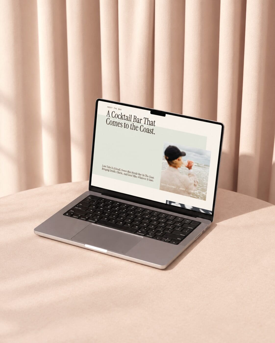 mobile bar on a laptop in a feminine styled photoshoot
